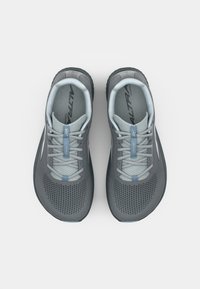 Gray running shoes with a mesh upper and light blue accents. Features a padded collar, raised heel, and textured rubber outsole.