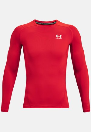 Maglia atletica rossa a maniche lunghe con vestibilità aderente, realizzata in materiale liscio. Presenta un collo rotondo e un logo bianco sul petto.