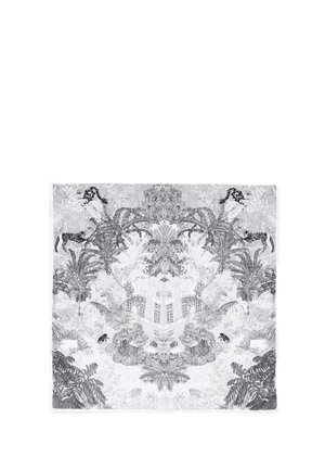 Disegno dettagliato in bianco e nero, simmetrico, di piante tropicali, palme, leopardi e una facciata centrale di edificio ornato.