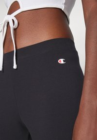 Champion GRAPHIC LEGGINGS - Leggings - black