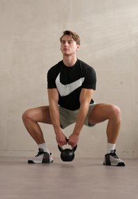 Nike Performance PRIMARY FLEECE - Spordišortsid - jade horizon