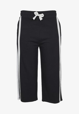 Pantaloni sweat neri a vita alta con strisce laterali bianche, elastico in vita e cordoncino. Tessuto morbido con vestibilità comoda.