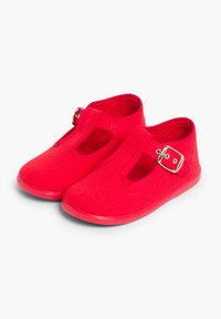 Scarpe di tela rosse con punta rotonda, design a T-bar e fibbia in argento. Materiale morbido e suola piatta in gomma. Cinghia regolabile per una vestibilità sicura.