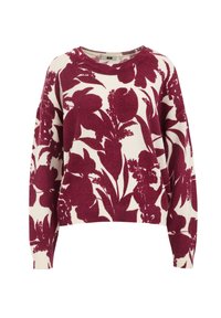 Adīts džemperis ar krēmkrāsas pamatni, uz kura ir izteikts bordo ziedu raksts, plaša dekoltē un nedaudz pārāk liels piegriezums ar ribotiem aprocēm.