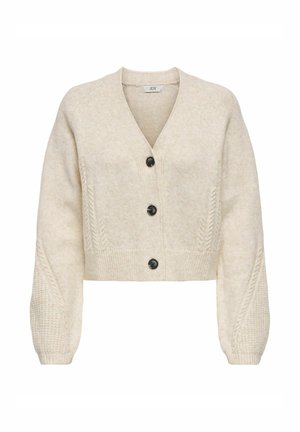 Cremefarvet cropped cardigan med V-hals, fire sorte knapper og teksturerede kabelstrikærmer. Blødt, strikket materiale med et afslappet design.