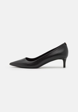 Black leather pointed-toe pump with a low heel. Smooth texture, sleek design, and subtle detailing at the heel.