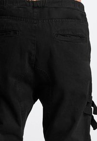 DEF LUCIO ANTIFIT - Jeans Relaxed Fit - black