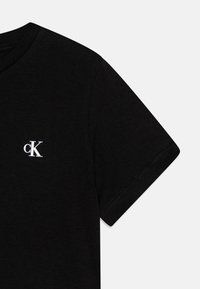 Calvin Klein Jeans MONOGRAM UNISEX 2 PACK - Pamata T-krekls - papyrus/black