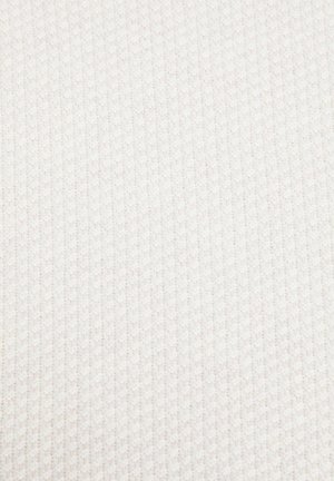 Getextureerde stof in een lichte beige kleur met een subtiel ribbelpatroon, wat een zachte, geweven uitstraling creëert. Geen opvallende accenten of hardware.