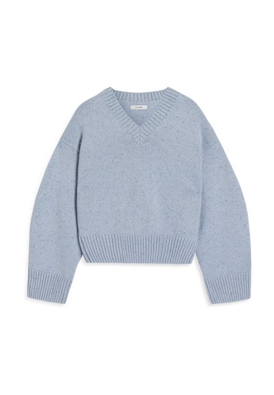 Light blue cropped sweater with a V-neck, made of soft knit material, featuring ribbed cuffs and hem, with a speckled pattern throughout.
