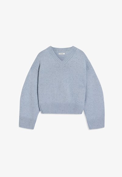 Light blue cropped sweater with a V-neck, made of soft knit material, featuring ribbed cuffs and hem, with a speckled pattern throughout.