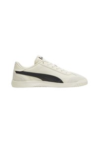 Scarpe in pelle crema con una striscia in suede nero, dotate di punta arrotondata, suola piatta e chiusura tradizionale con lacci.