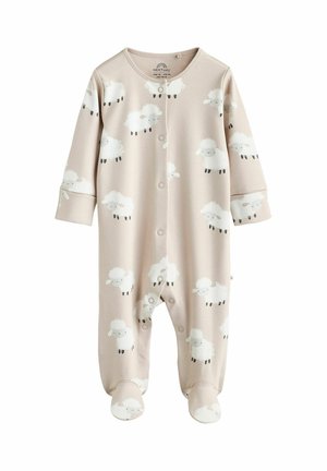 Un grenouillère pour bébé couleur beige clair en tissu doux, ornée d'un motif de moutons. Elle possède un col rond, des boutons-pression et des pieds fermés.