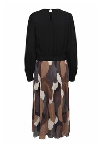 Black long-sleeve dress with a pleated brown, beige, and white patterned skirt, featuring a keyhole back and elastic waistband.