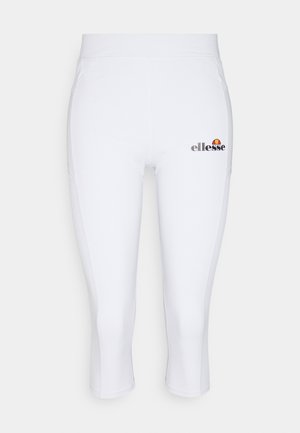 Bílé capri legíny z elastické, hladké tkaniny. Na přední straně je černé a barevné logo "ellesse". Bez viditelných zapínání nebo kapes.