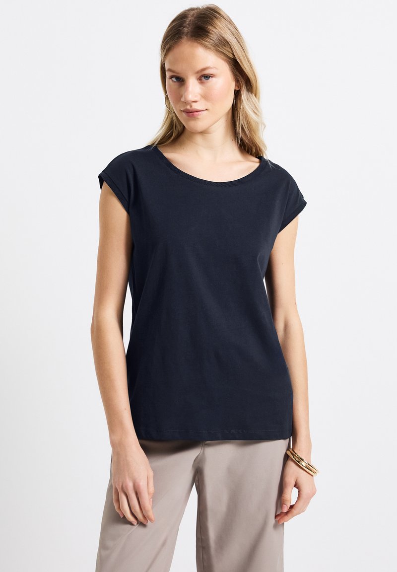 Musta, lyhythihainen t-paita kevyestä puuvillasekoitteesta, jossa on pyöreä pääntie ja rento malli, jonka pinta on sileä.