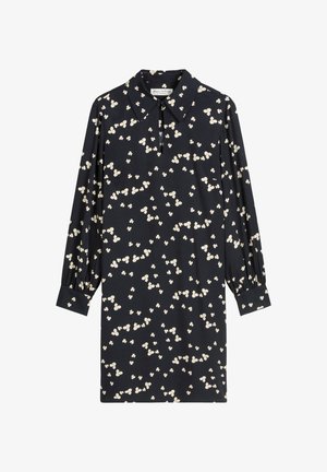 Marineblauwe jurk met een bloemmotief in crème, lange mouwen, een kraag en een knoopsluiting bij de hals. Gemaakt van lichtgewicht stof.