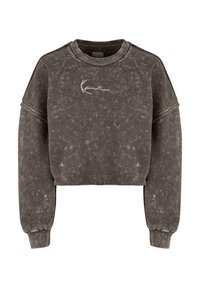Grå kort sweatshirt laget av mykt stoff med teksturert finish. Har senkede skuldre og en liten hvit logo på brystet.