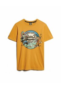 Camiseta de algodón color naranja con un diseño gráfico vintage redondo que presenta un dragón y un tigre. Mangas cortas y cuello redondo.