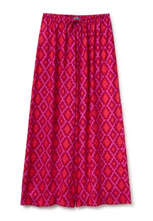 Pantalon à jambes larges de couleur rose vif avec des motifs géométriques rouges en diamant et une taille élastique avec cordon de serrage.