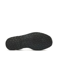 Black rubber shoe sole with a textured tread pattern featuring outlined wavy shapes and grooves for traction. Clean design with no markings.