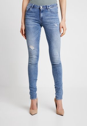 Jeansy Skinny Fit
