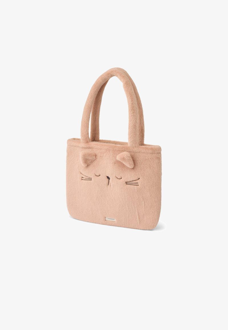 Sac fourre-tout beige doux avec motif visage de chat, comprenant des oreilles, des yeux fermés, des moustaches et deux poignées rembourrées.