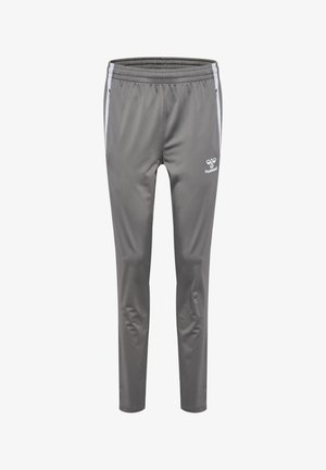 Graue Sporttrackpants mit weißen Seitstreifen, elastischem Bund und kleinem weißen Hummel-Logo auf dem linken Oberschenkel.
