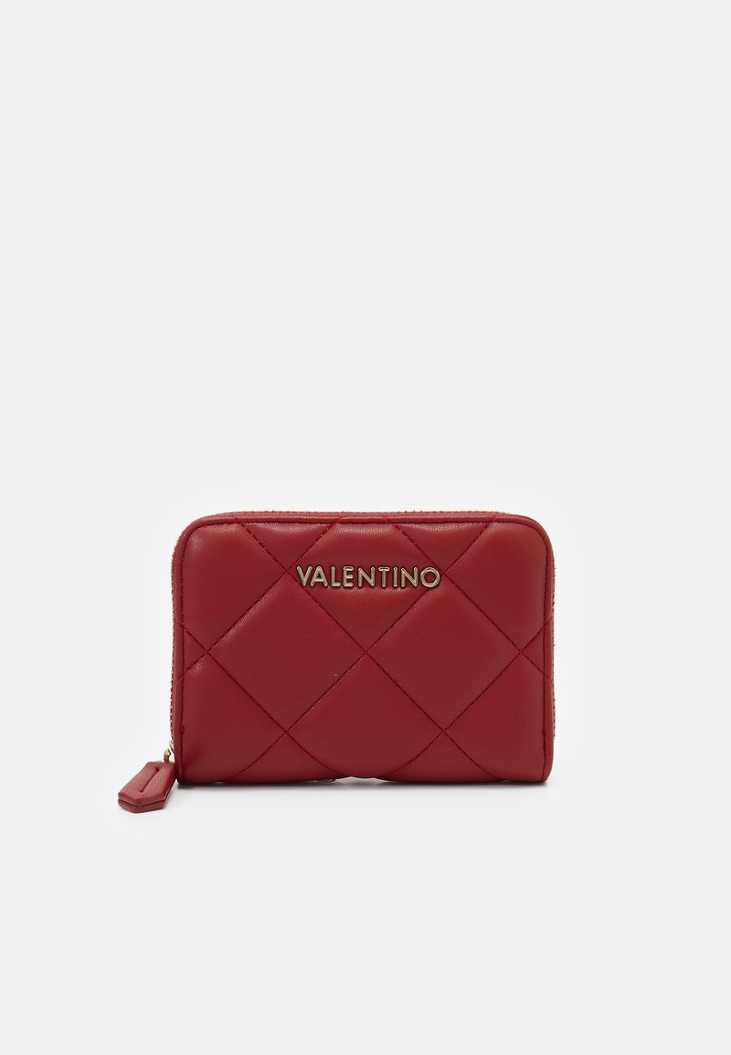 Red quilted leather wallet featuring gold "Valentino" logo, zip closure, and textured pattern. Compact rectangular shape.