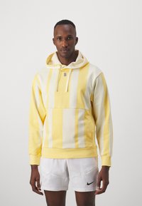 Nike Performance Mikina s kapucňou - topaz gold/coconut milk