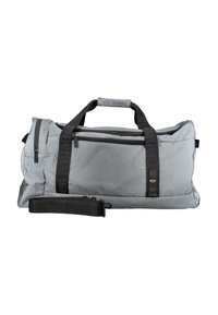 Szary torba typu duffel o matowym wykończeniu, z czarną kieszenią zapinaną na zamek, wzmocnionymi uchwytami oraz regulowanym paskiem z detalami logo.