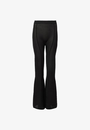 Schwarze, weit geschnittene Hosen mit gerippter Textur. Elastischer Bund mit horizontalem Streifenmuster. Leichtes, dehnbares Material.