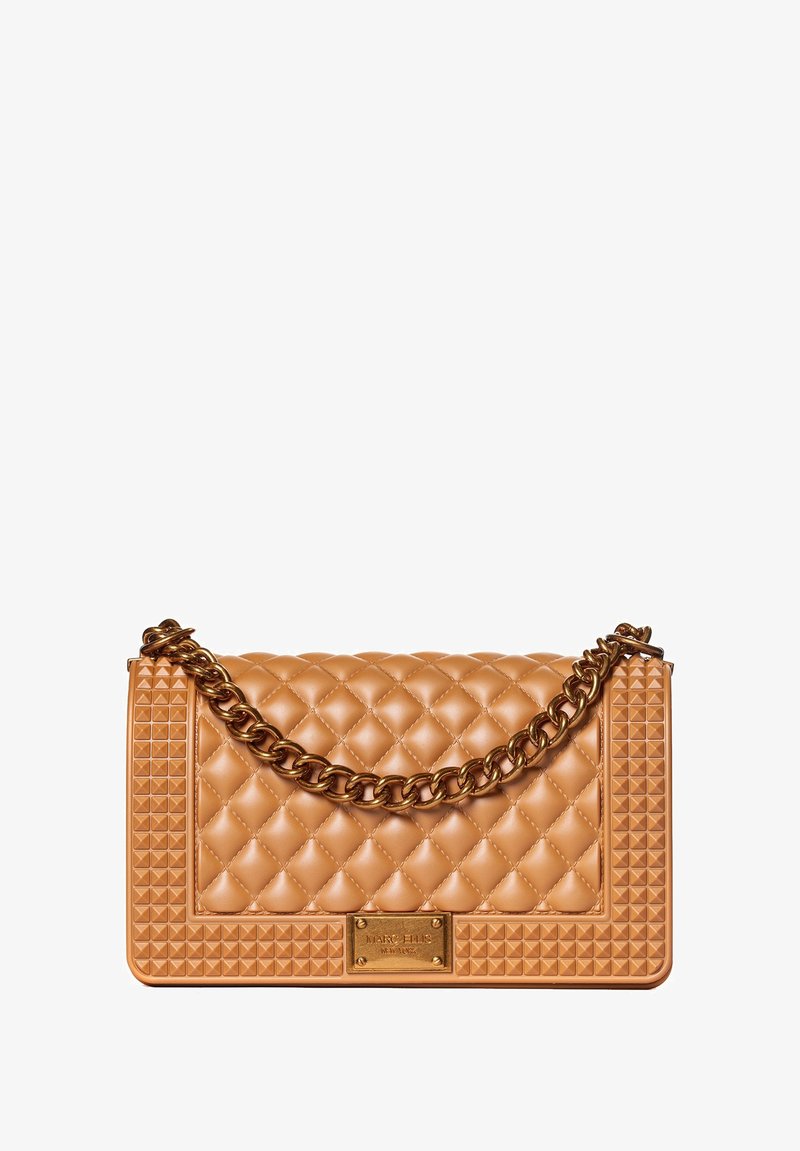 Quilted caramel faux leather handbag with gold-tone chain strap, pyramid stud accents, and a decorative plaque on the front.