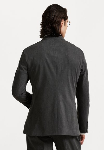 Donkergrijze gepersonaliseerde blazervest met een slim fit, voorzien van een enkele split, geknipte revers en subtiele stofstructuur. Alleen achteraanzicht.
