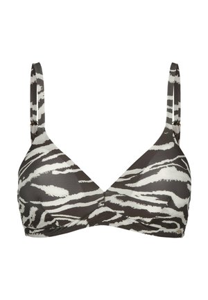 Sort-hvid zebra-print bh med justerbare tynde skulderstropper og formede skåle, vist på en hvid baggrund.