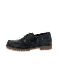 Scarpe da barca in pelle nera con suola in gomma, cuciture a contrasto e occhielli in metallo. Presentano un punta rotonda in stile mocassino.