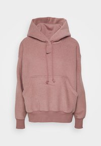 Sweat à capuche rose en tissu doux, doté d'une poche kangourou, de poignets côtelés et d'un petit logo noir sur la poitrine.