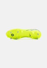 Nike soccer cleat featuring a bright yellow upper, textured surface, and six firm ground studs, with a black logo accent on the side.