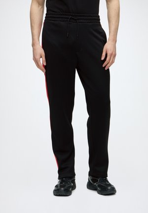 HUGO DOLOS - Pantalon de survêtement - black