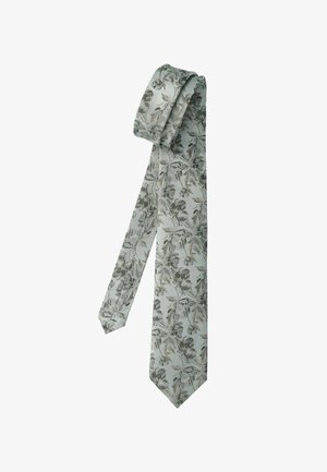 Hellgraue Krawatte mit dunkelgrauem Blumenmuster, locker gefaltet mit sichtbarem Spitzende vor weißem Hintergrund.