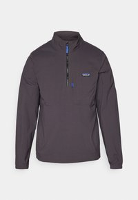 OUTDOOR EVERYDAY MARSUPIAL - Vjetrovka - ink black