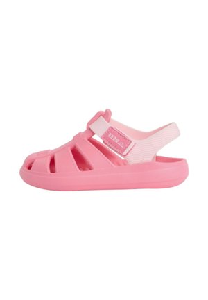 Sandalo chiuso rosa per bambini con cinturino regolabile e design ventilato, realizzato in materiale gommoso flessibile.