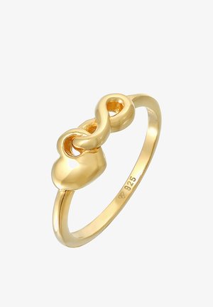Guldfarvet ring med et hjerte- og uendelighedsdesign. Fremstillet af 925 sølv, har den en glat, poleret overflade uden yderligere detaljer.