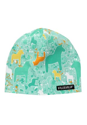 Baumwollmütze in Mintgrün mit einem verspielten Muster aus weißen, gelben und orangefarbenen Tier-Silhouetten. Mit einem Markenetikett an der Seite.