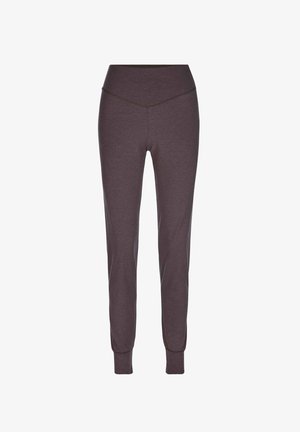 Donkergrijze sportbroek gemaakt van zachte, rekbare stof. Heeft een hoge taille, taps toelopende benen en aansluitende boorden bij de enkels.