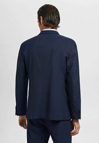 Navy blue suit jacket, textured fabric, single back vent, notched lapels, with three-button cuffs and a tailored fit.