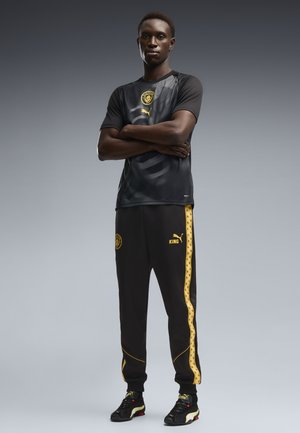 Puma, MANCHESTER CITY FC WARM UP JERSEY - Article de supporter d'équipe de club - black-archive gold-coloured