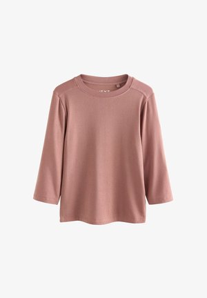 Geripptes Langarmshirt in sanftem Rosa. Mit Rundhalsausschnitt und leicht lockerem Schnitt mit dreiviertel Ärmeln. Robuste Stoffstruktur.