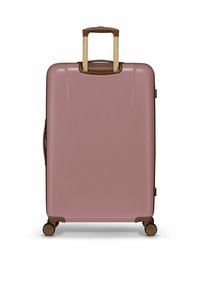 Harde koffer in lichtroze met een gladde afwerking. Voorzien van een bruine uitschuifbare handgreep en vier zwarte wielen voor mobiliteit.