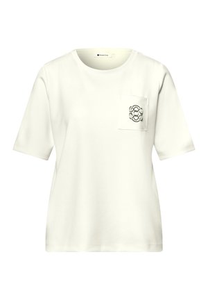 Chemise blanche à manches courtes et col rond avec une poche poitrine ornée d'un petit motif abstrait noir.